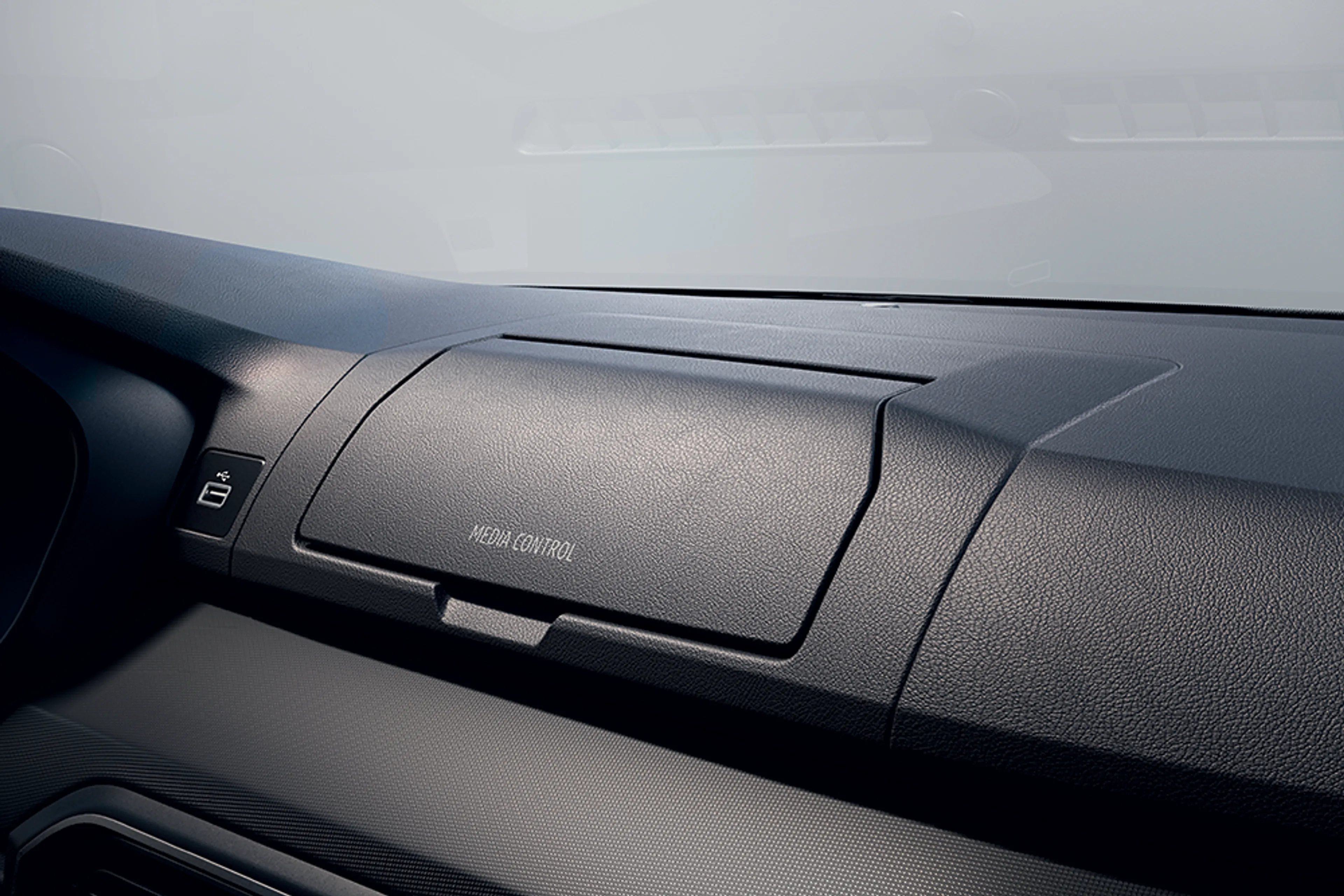 when the phone is not in place, the housing disappears into the media control dashboard